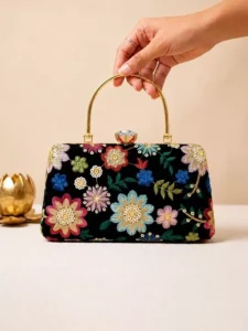Black Floral Velvet: Clutiva black velvet premium handbag featuring vibrant multi-colored floral embroidery.