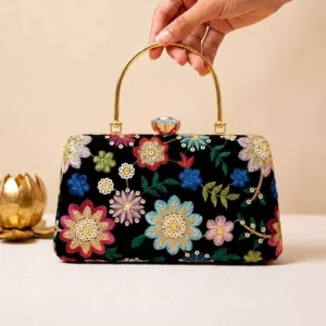 Black Floral Velvet: Clutiva black velvet premium handbag featuring vibrant multi-colored floral embroidery.