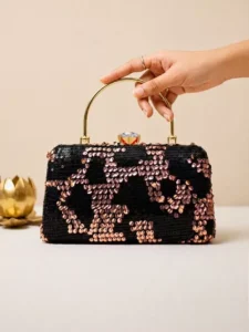 Black/Rose Gold Sequin: Clutiva midnight black luxury clutch with rose gold sequin patterns and metallic top handle.