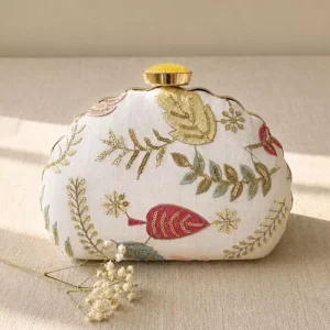 White/Gold Floral Image: Clutiva elegant white statement clutch with gold and pastel floral embroidery.
