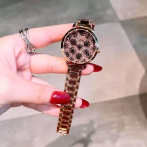 Clutiva Aura premium statement evening watch for women in mirror-shine silver finish with a diamond-dust textured dial face.